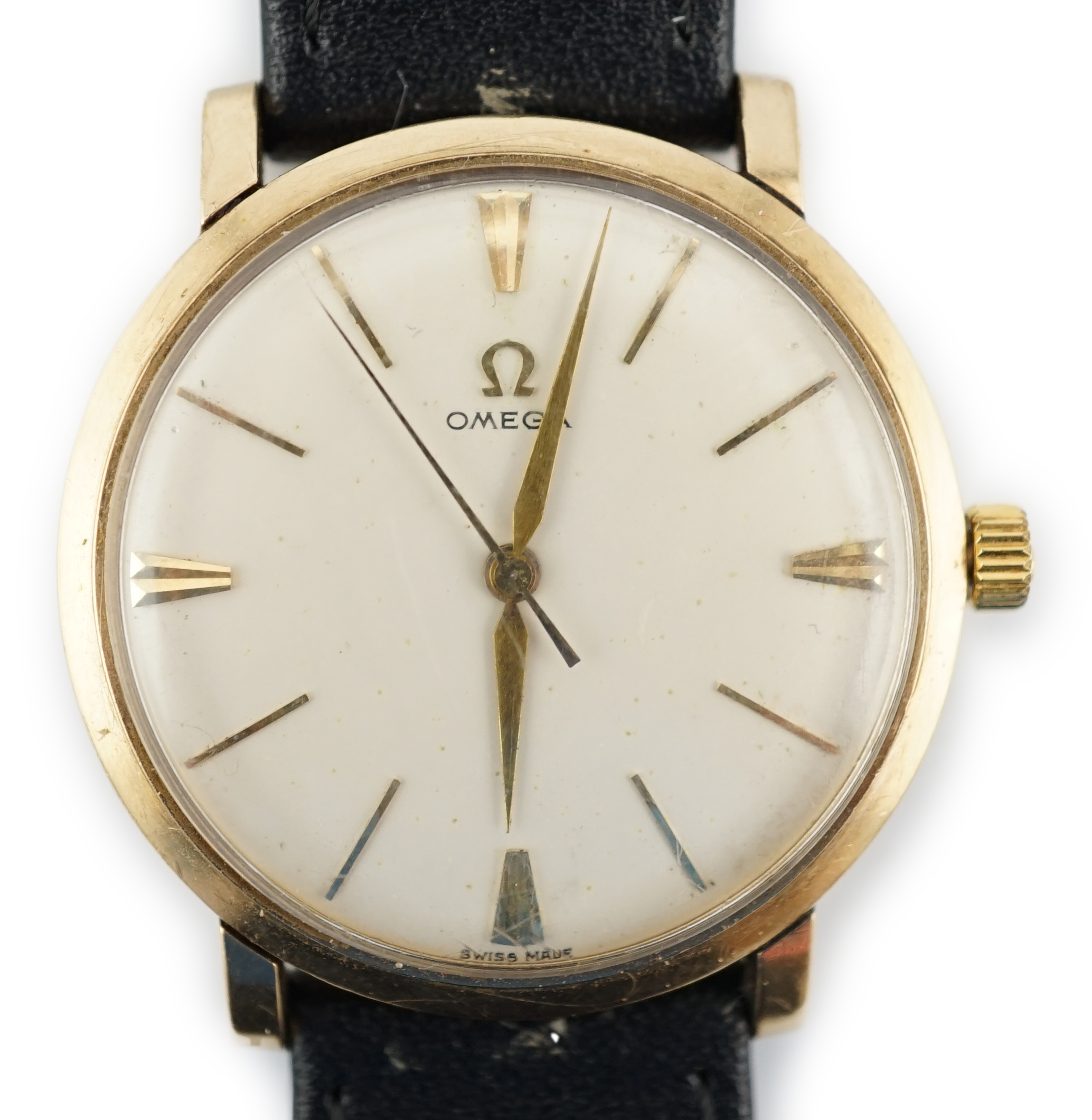 A gentleman's gold Omega manual wind wrist watch